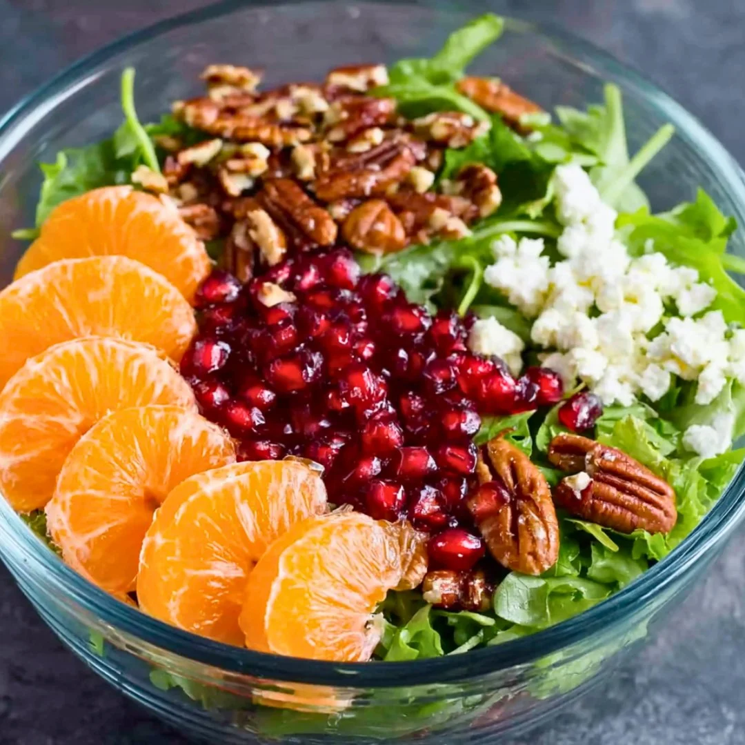 Colorful winter salad featuring seasonal vegetables and fruits