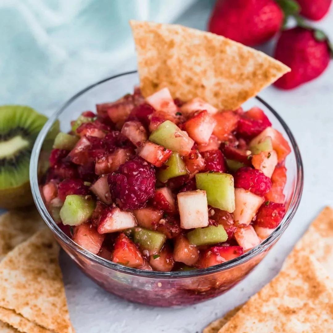 Sweet fruit salad served with cinnamon sugar tortilla chips